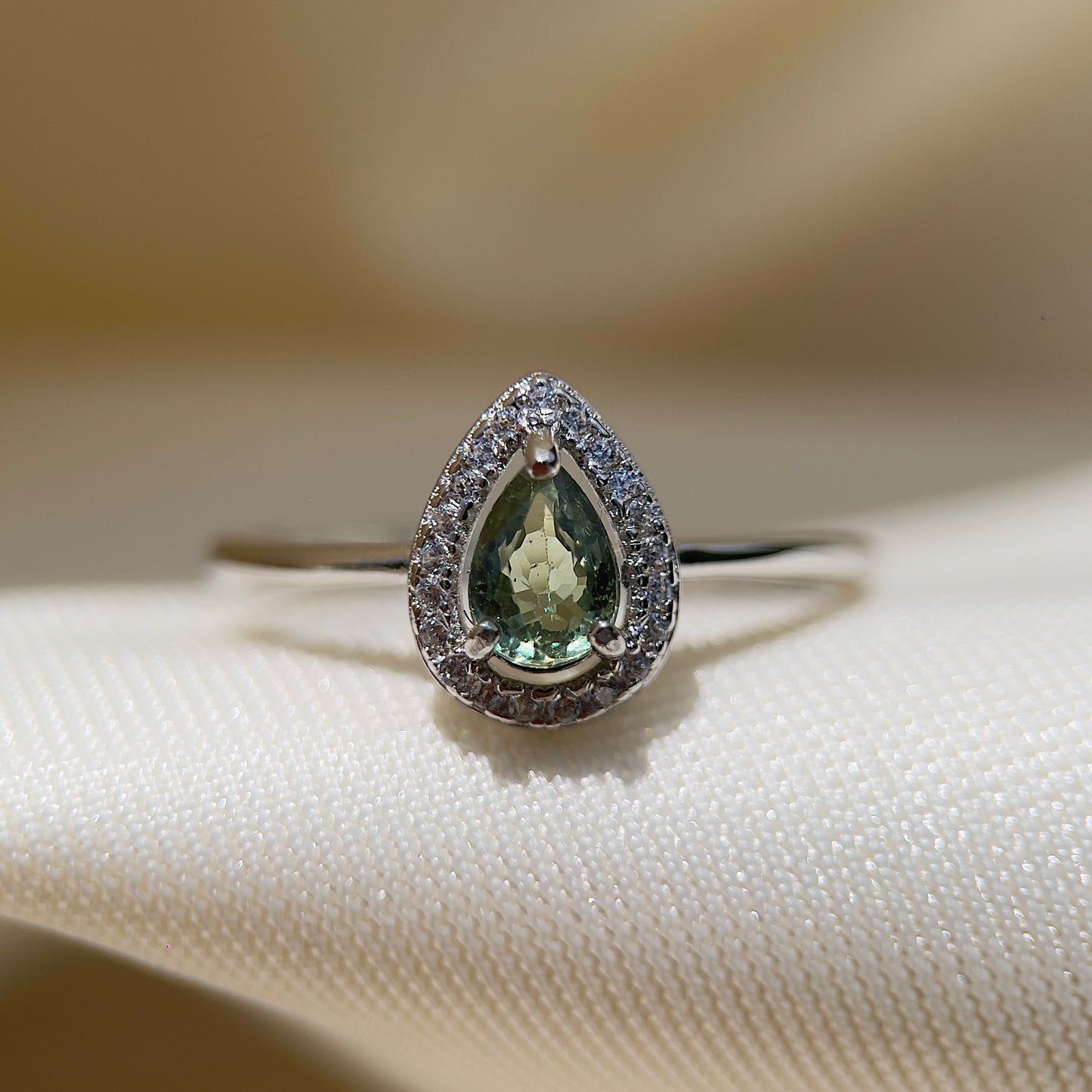 Green Sapphire Pear Halo Ring