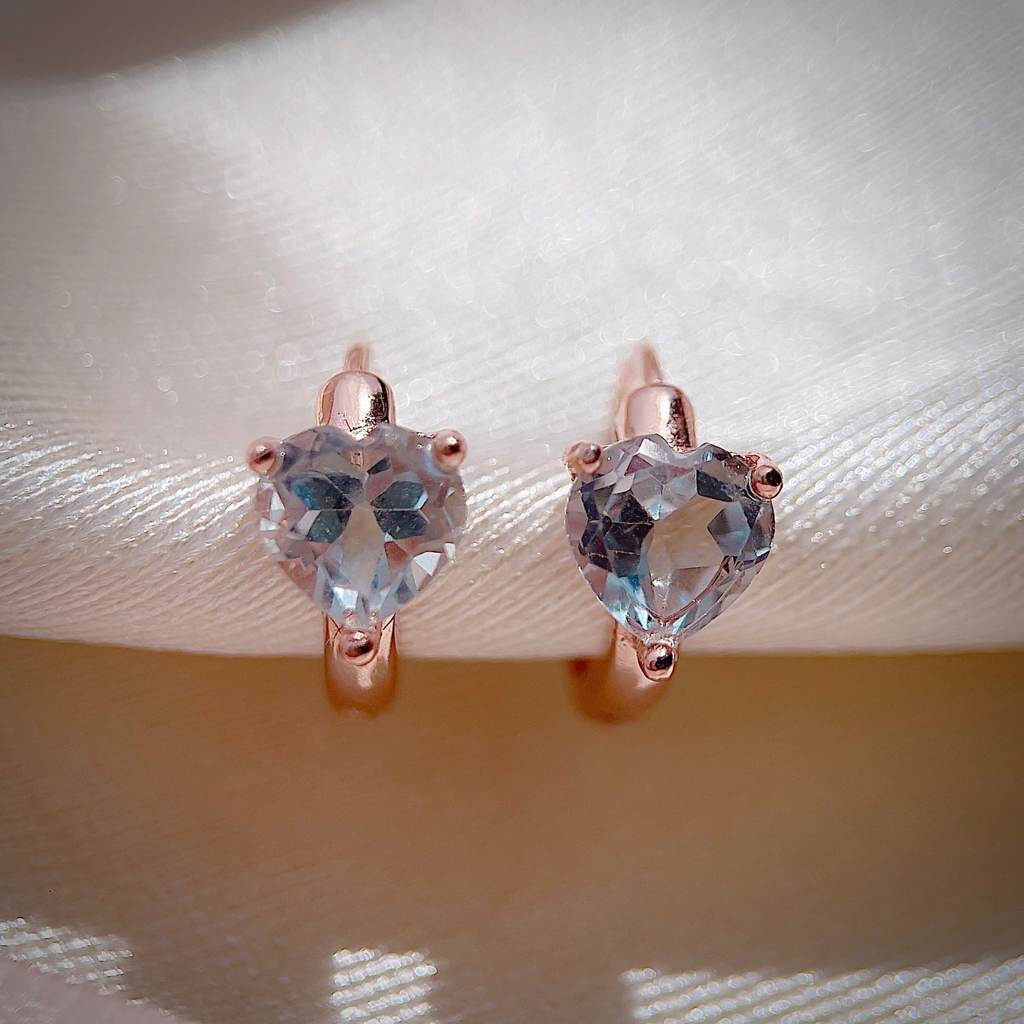 Blue Topaz Heart Huggies