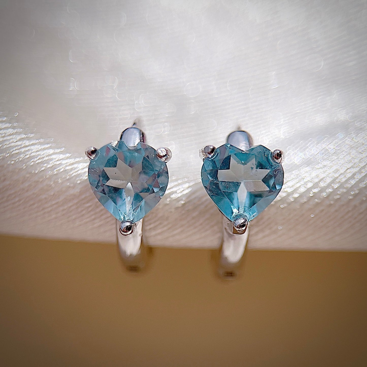 Blue Topaz Heart Huggies