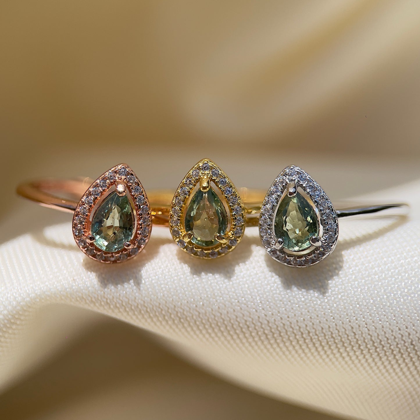 Green Sapphire Pear Halo Ring