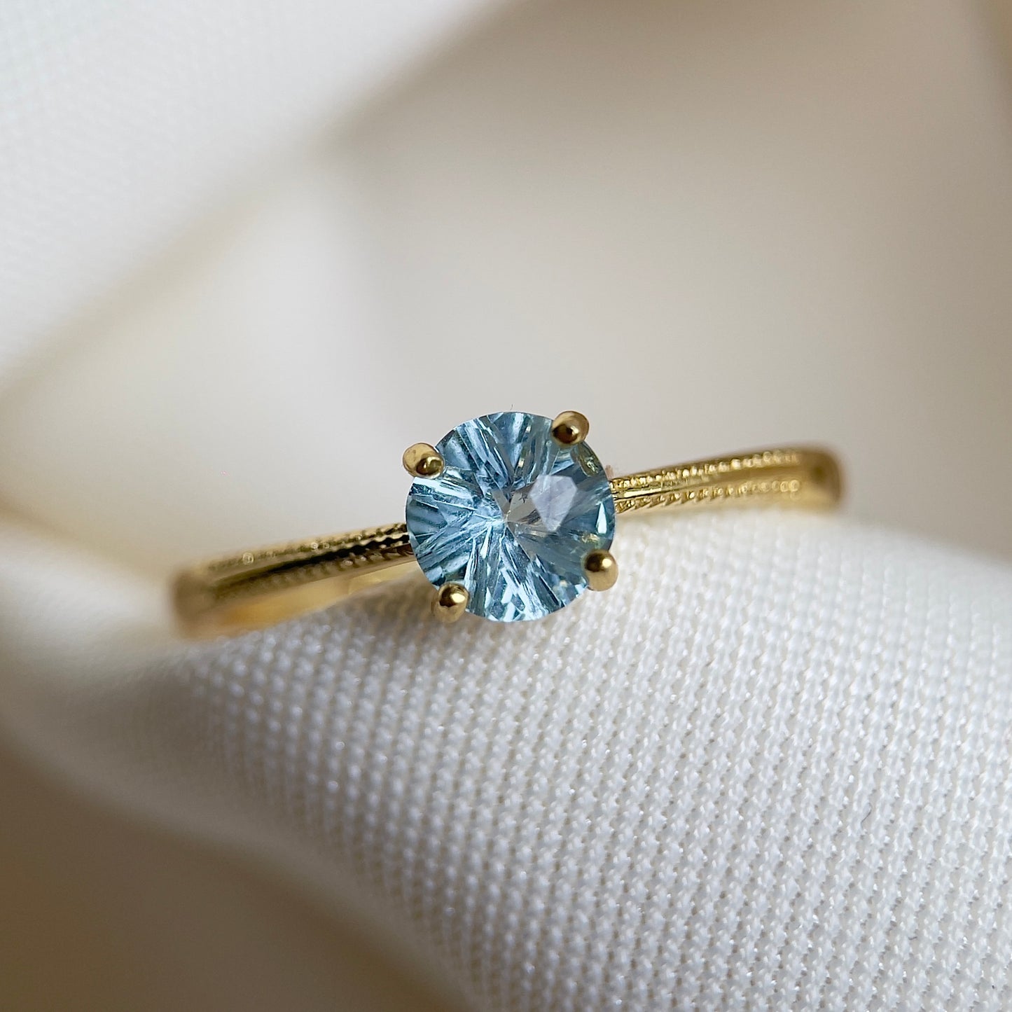 Firework Sky Blue Topaz Solitaire Ring