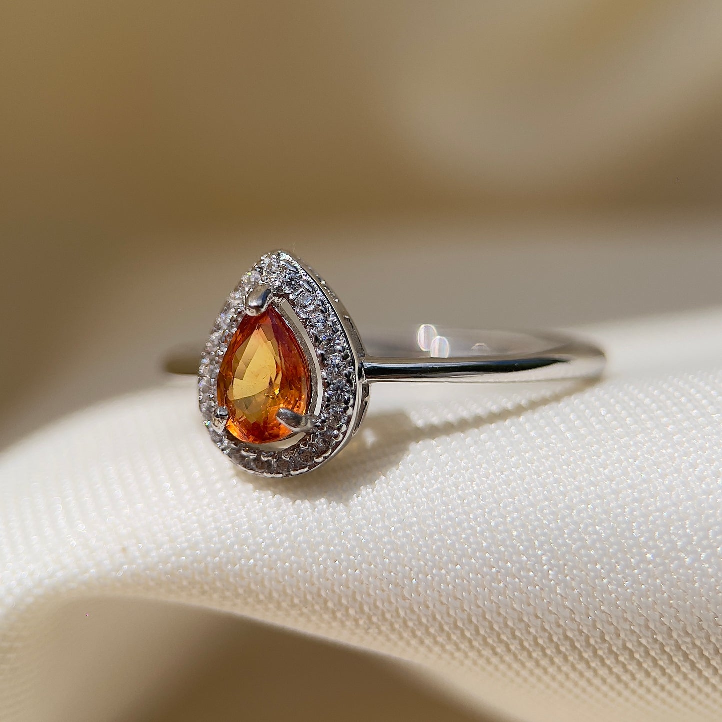 Orange Sapphire Halo Pear Ring