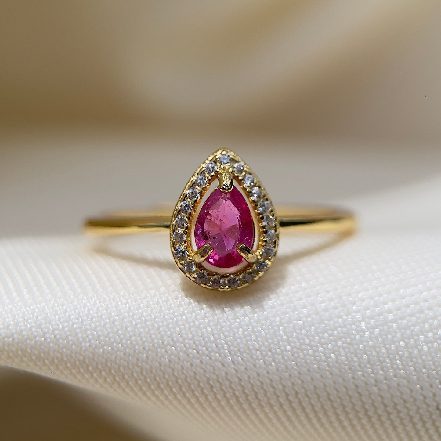 Pink Sapphire Halo Pear Ring