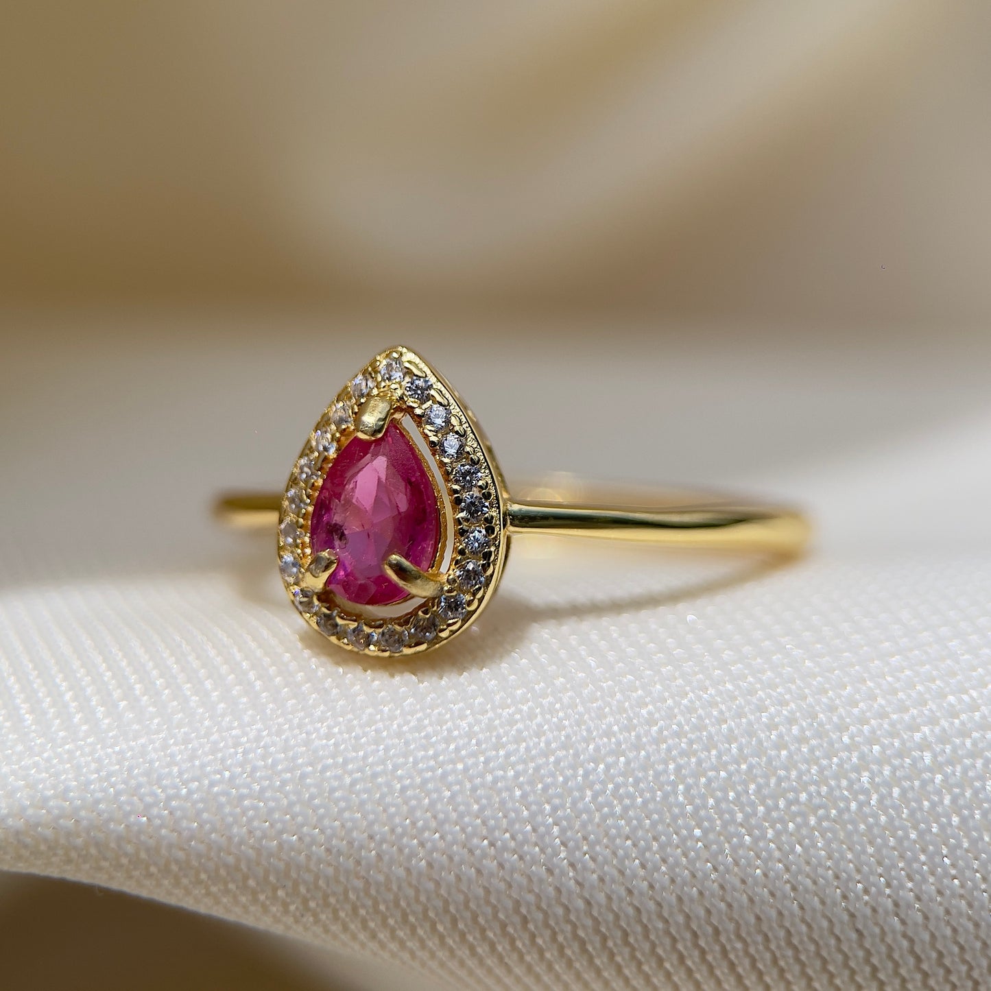 Pink Sapphire Halo Pear Ring