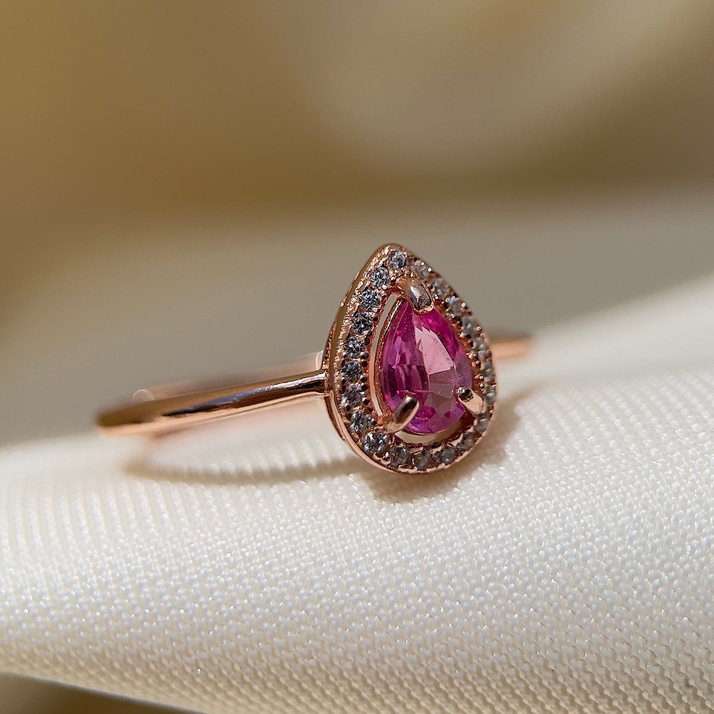 Pink Sapphire Halo Pear Ring