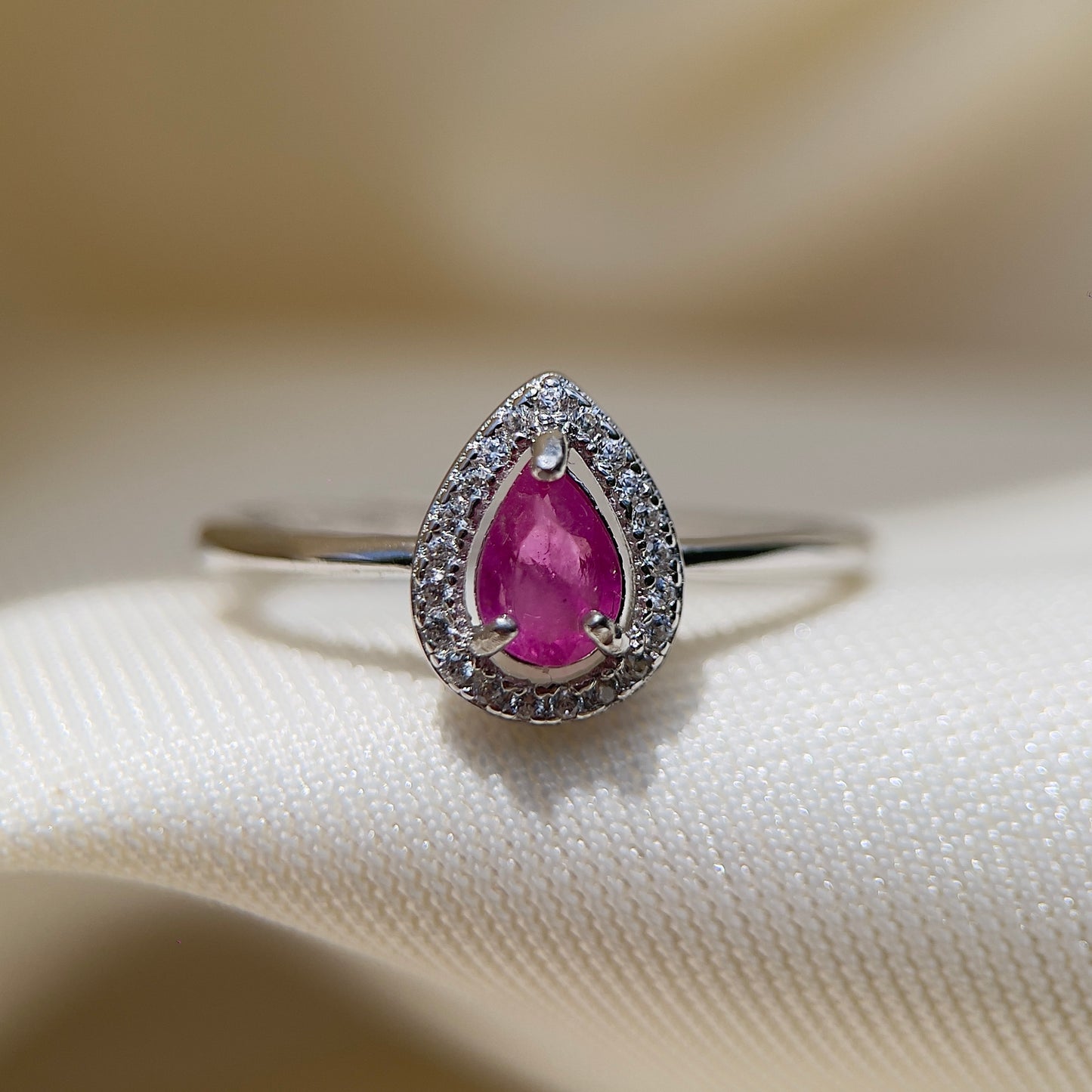 Pink Sapphire Halo Pear Ring