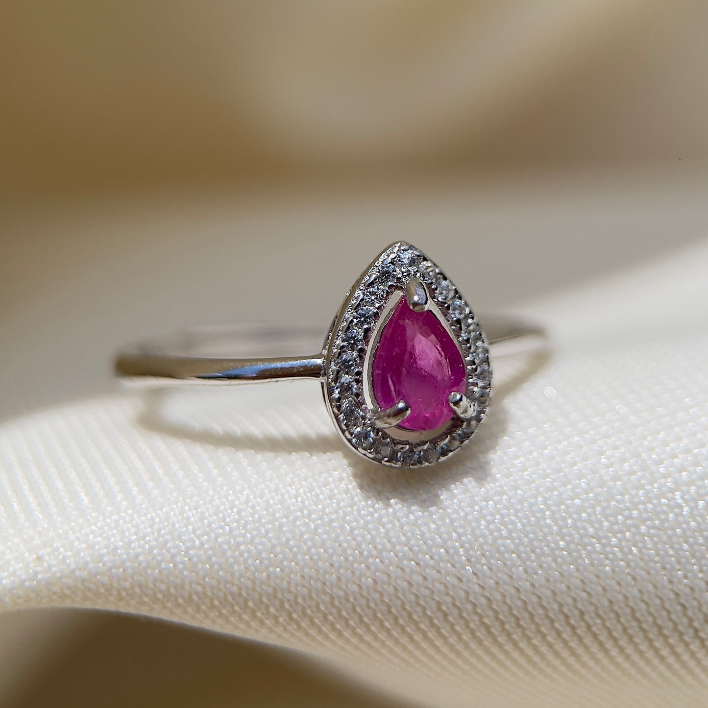 Pink Sapphire Halo Pear Ring